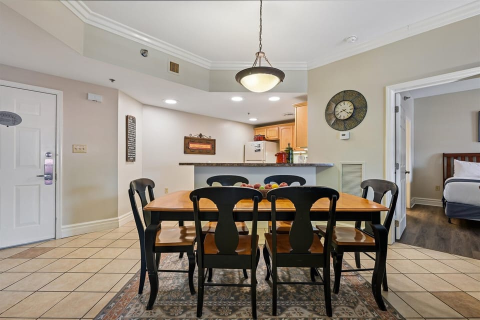 Your spacious dining room flows seamlessly into the modern kitchen, perfect for memorable family meals and vacation conversations.