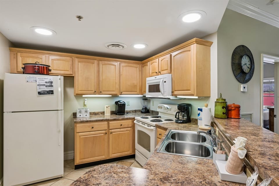 Your fully equipped kitchen awaits with granite counters, modern appliances, and everything you need to create memorable meals during your stay.
