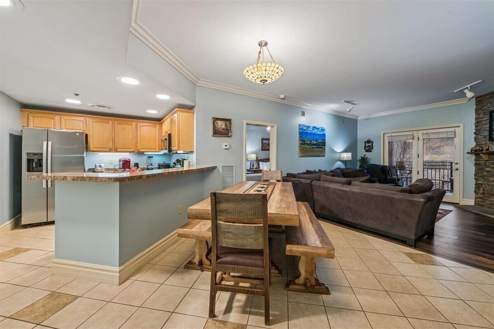 Relax in your spacious open-plan retreat where the gourmet kitchen flows into elegant dining and cozy living areas, perfect for gathering.