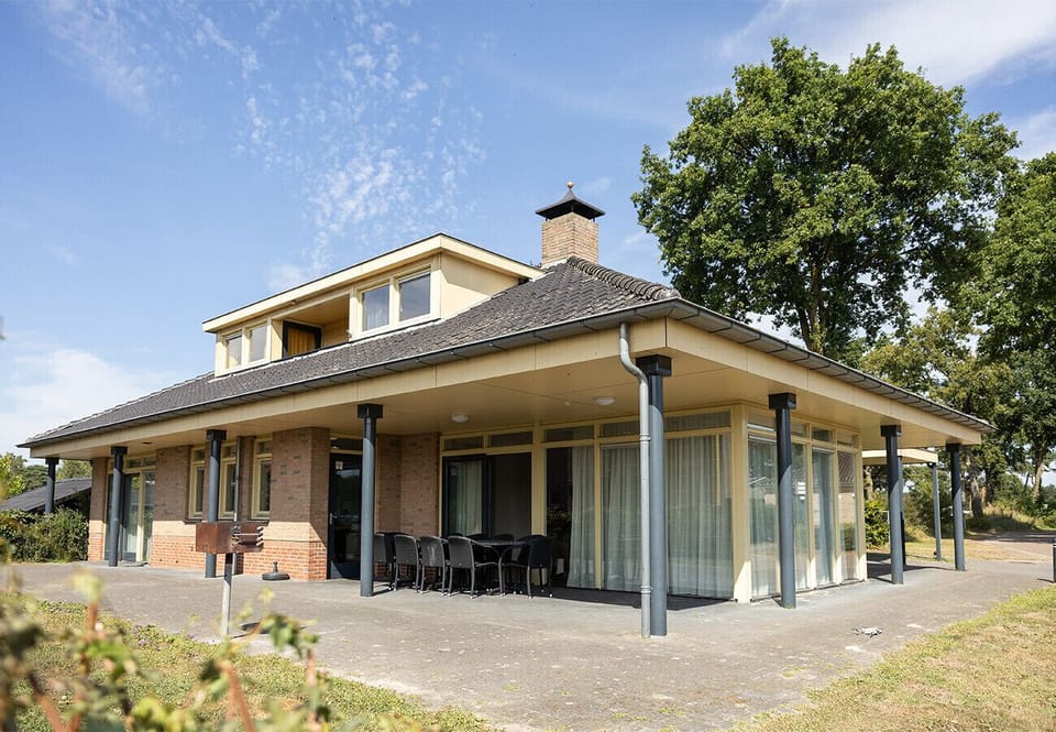 garden with barbecue and garden set