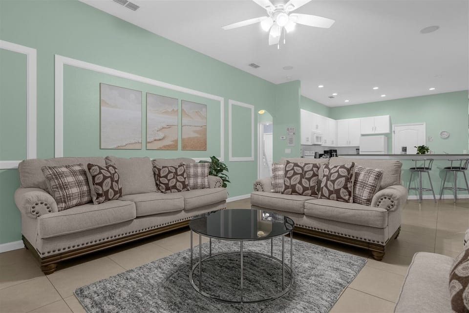 Living Room Area with Kitchen in Back Ground