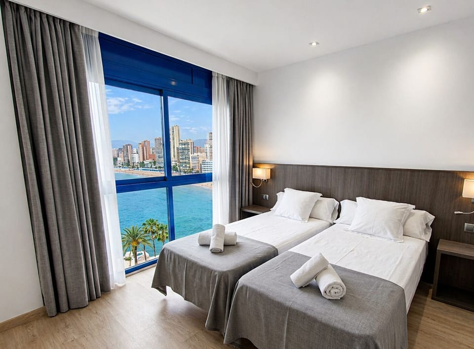 Superior Room Sea View | Premium bedding, desk, laptop workspace, blackout drapes