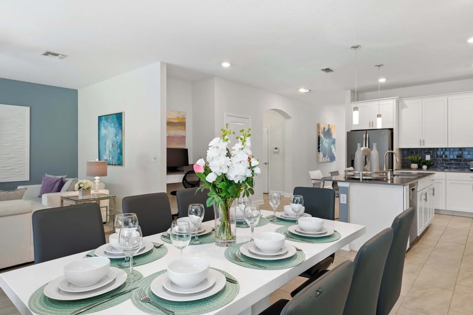 An open-concept layout that keeps the conversation flowing from the table to the kitchen.