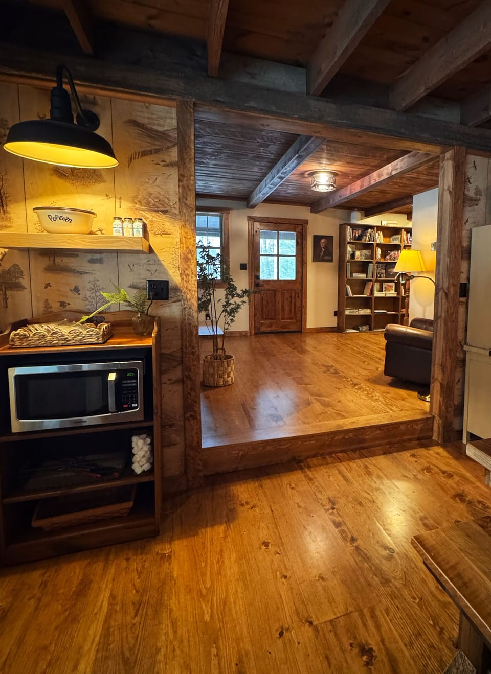 Enter the reading room from the kitchen. This room leads to the master bedroom.