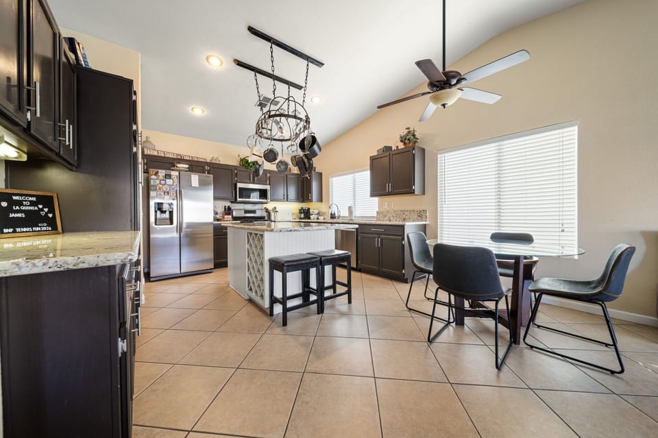 Fully equipped kitchen with island and modern appliances