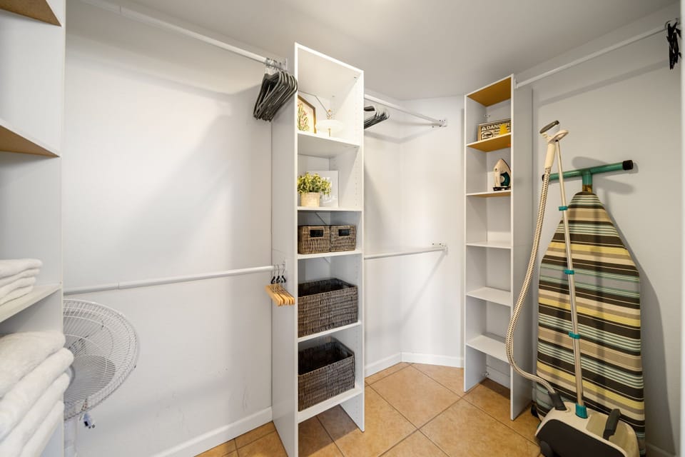 Laundry room with washer, dryer and storage space