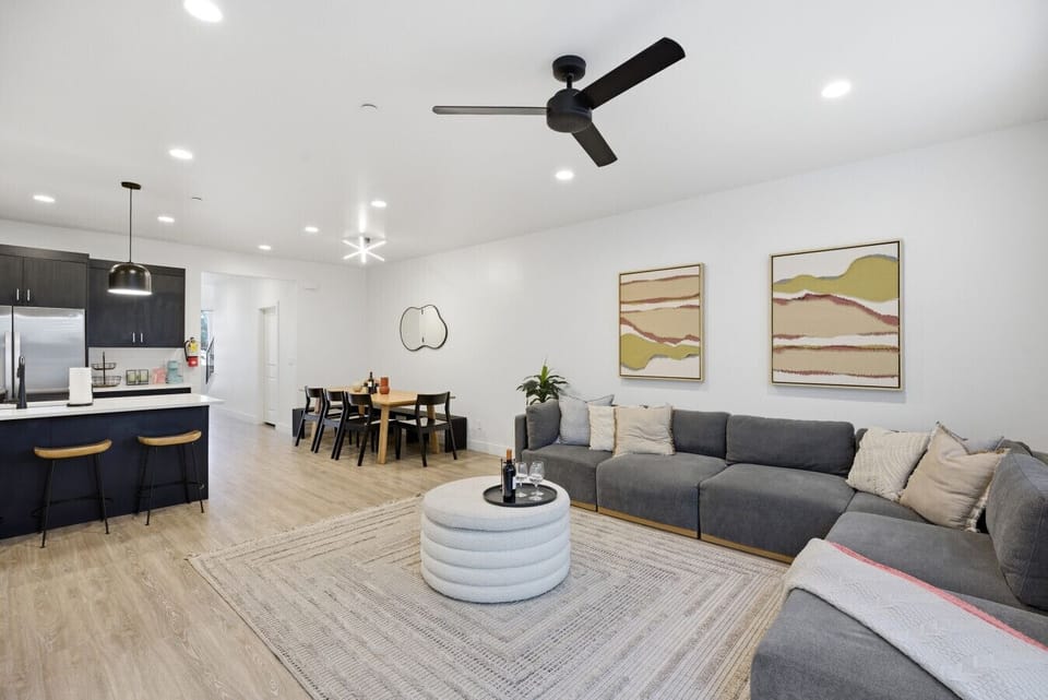 Living Room Oasis: Bright space with sleek decor, perfect for relaxation after outdoor adventures!