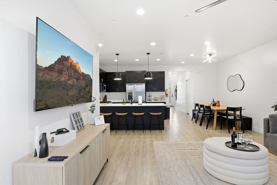 Living Room: Enjoy stunning views and modern comforts, perfect for relaxing after adventure!