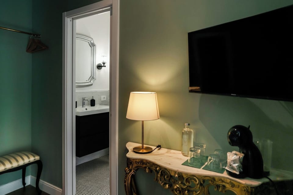Deluxe Double Room, Balcony, Courtyard View | Desk, laptop workspace, blackout drapes, soundproofing