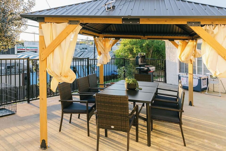 Gazebo outdoor dining area—ideal for meals, drinks, and gathering together.