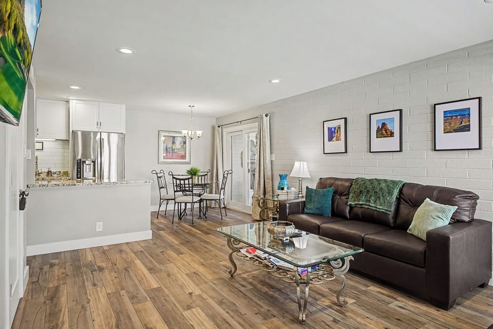 Open living and dining area with seating for four.
