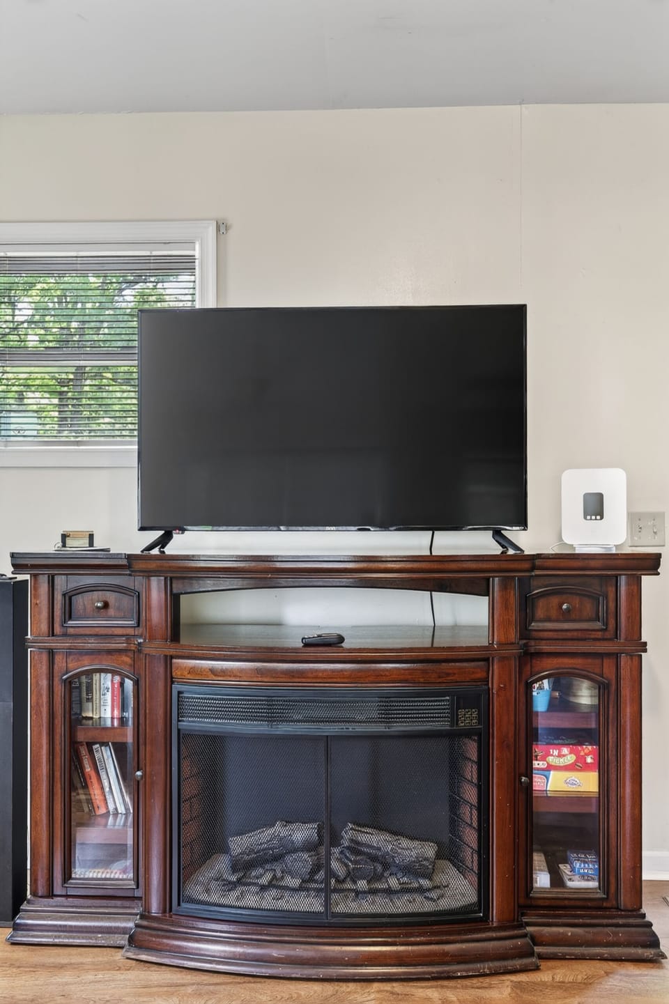 Roku TV and electric fireplace for relaxing evenings indoors.