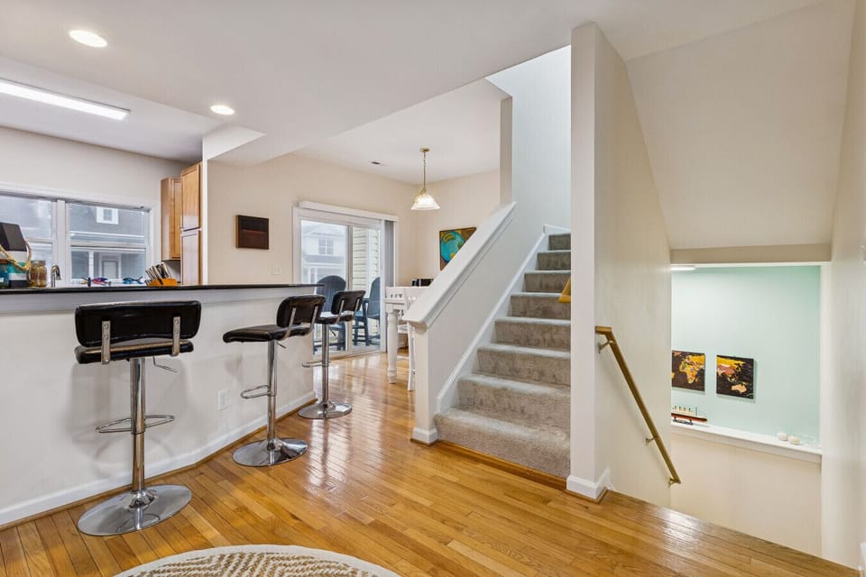 The second floor landing has the kitchen, dining, and living room.