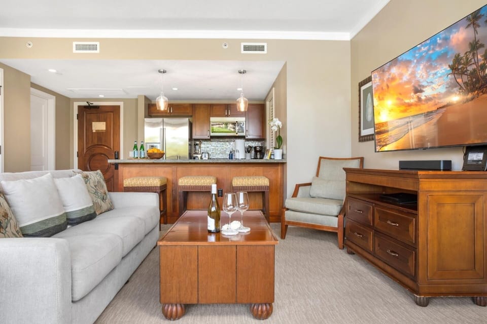 Relax in this bright island suite with modern kitchen, plush sofa, HDTV & tropical-inspired décor touches HKK-236