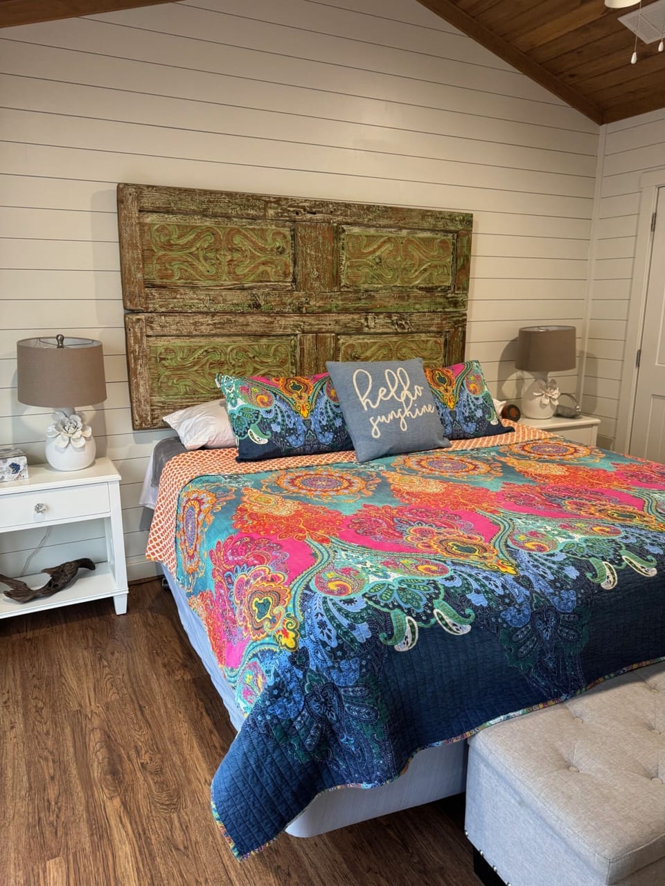 Colorful bedroom with queen bed