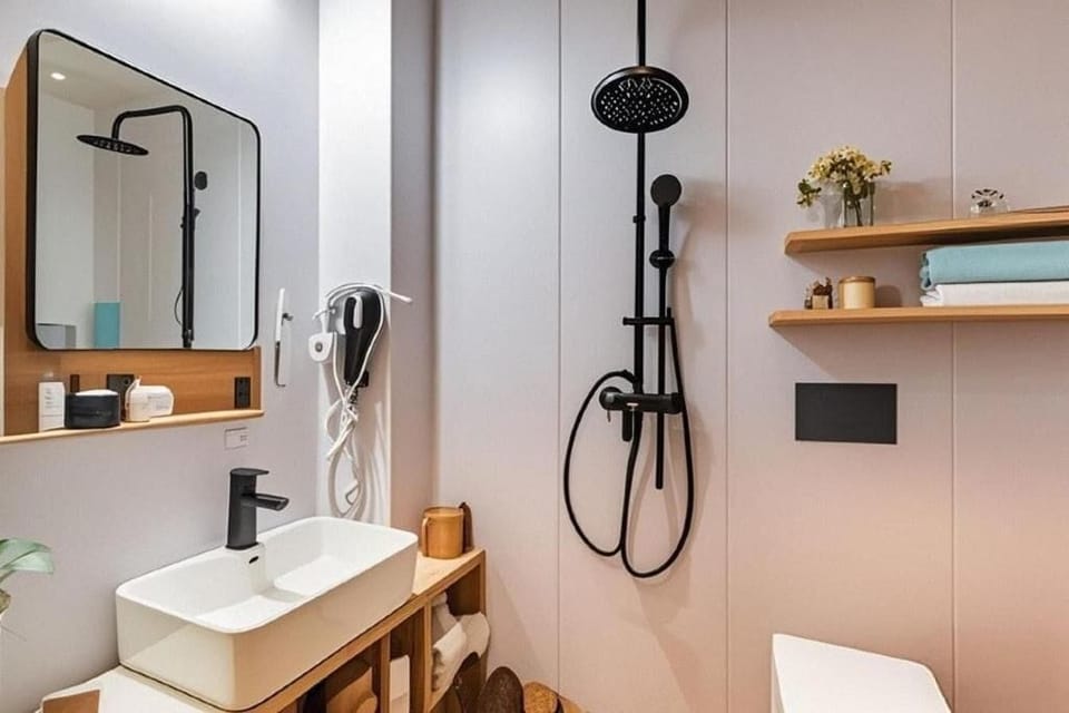 Shower, free toiletries, hair dryer, slippers
