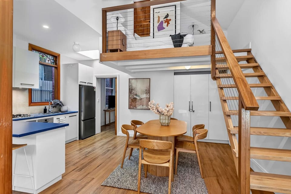 Open kitchen flowing into the home’s unique architectural layout.