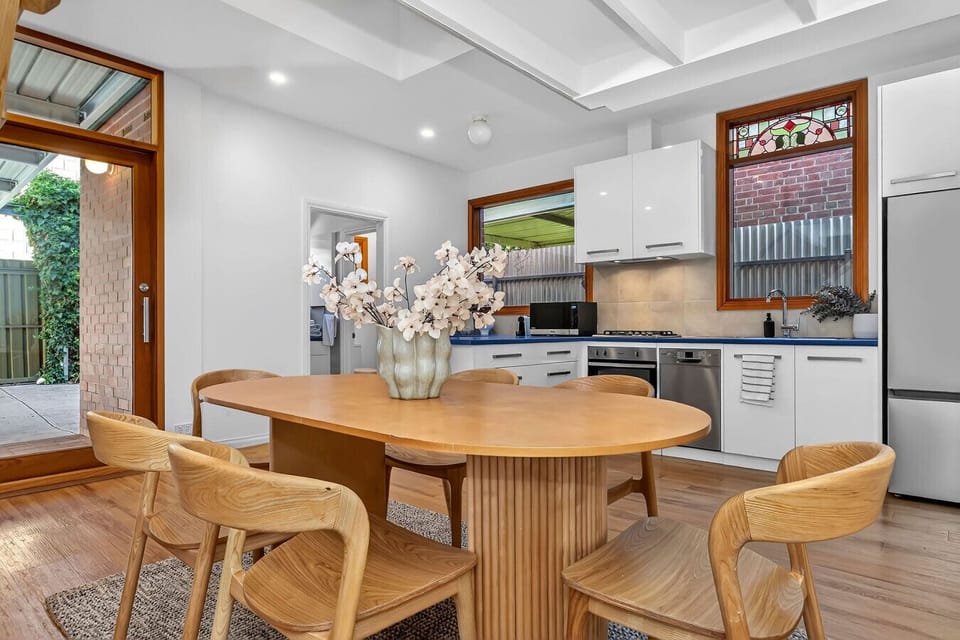 Light-filled kitchen and dining area perfect for relaxed meals.