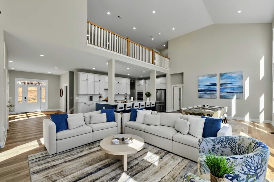 Living Space - Vaulted ceilings, lake views, and enough room for the whole group to settle in.