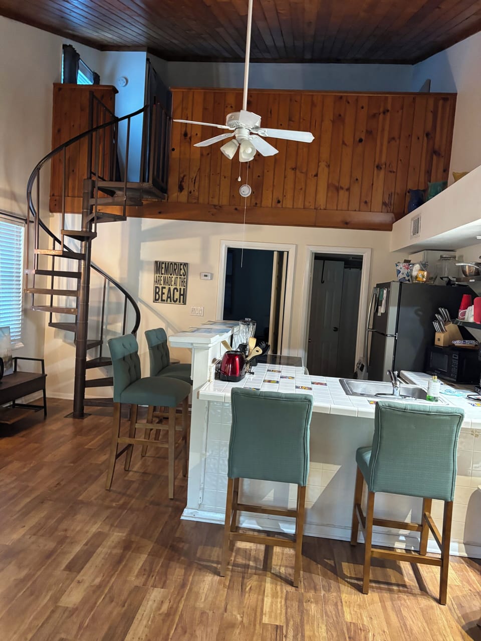 Plenty of room for gathering around the kitchen area.