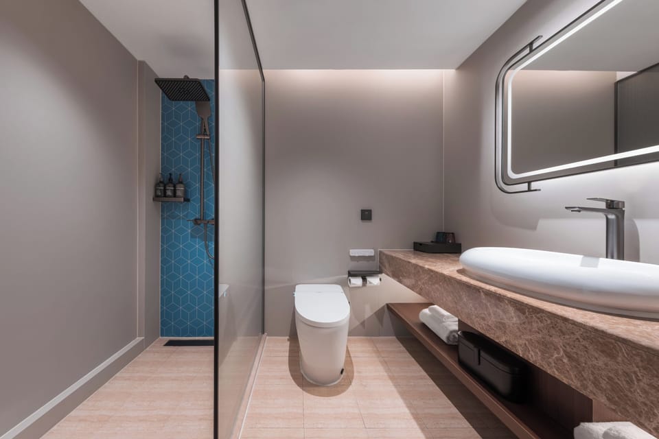 Classic Double Room Single Use | Bathroom | Shower, free toiletries, hair dryer, slippers