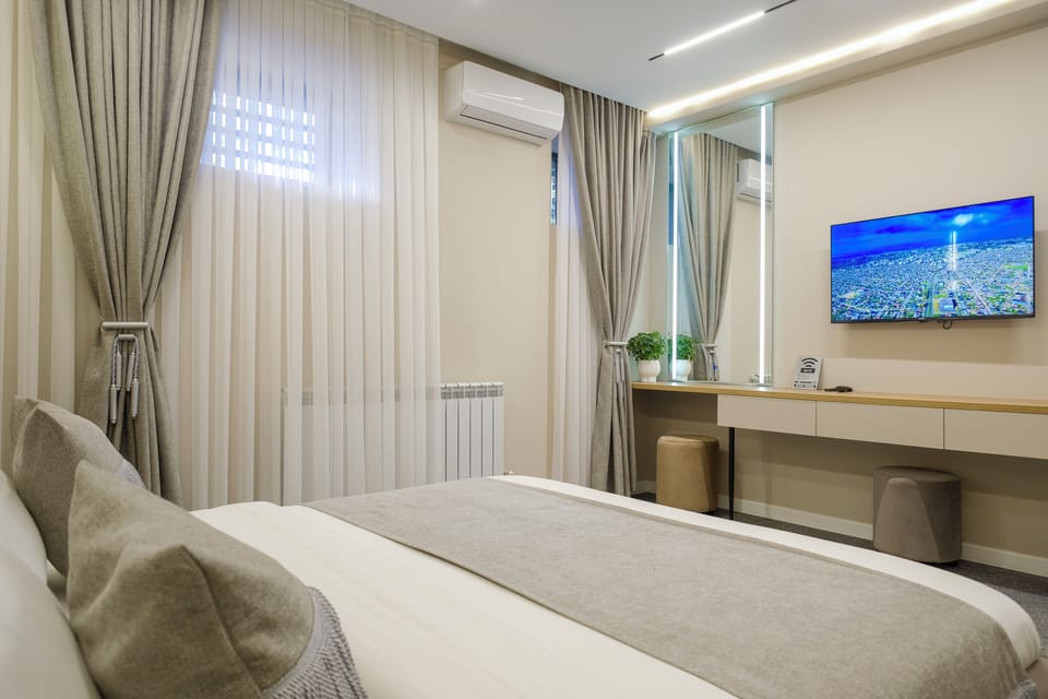 Economy Double Room, Courtyard View | In-room safe, desk, laptop workspace, blackout drapes