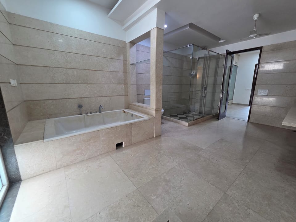 Family Suite | Bathroom | Shower, slippers, towels, soap