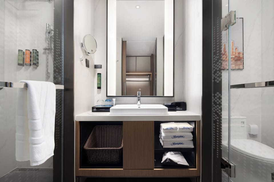 King Guest Room | Bathroom | Free toiletries, hair dryer, slippers, towels