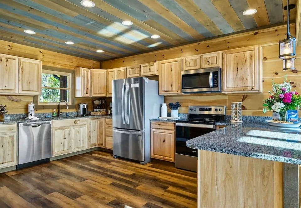 Spacious Kitchen with Modern Stainless Steel Appliances