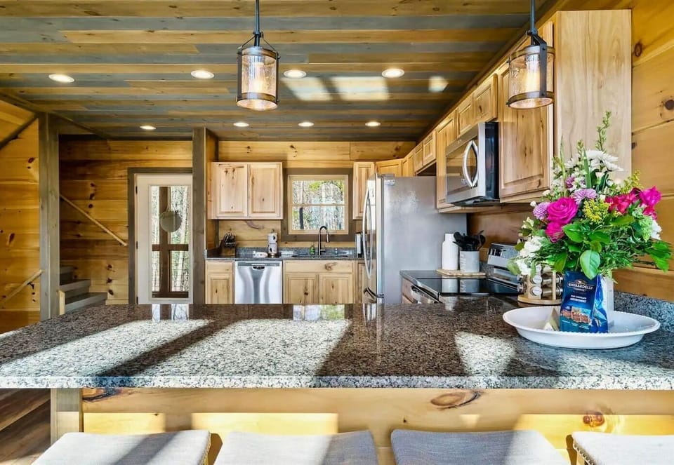 The Peninsula Style Kitchen Counter Makes it Easy to Cook Your Meal and Socialize at the Same Time