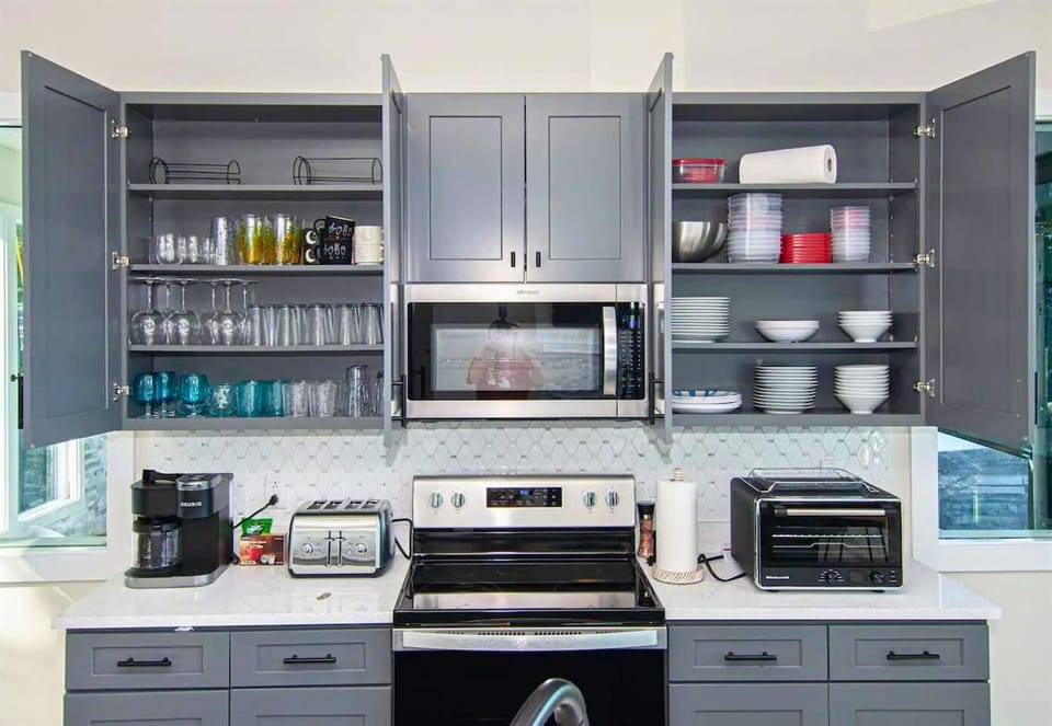The fully equipped kitchen includes all the modern appliances you need to cook up a feast, whether large or small.