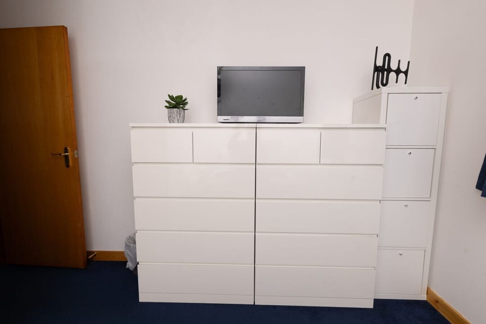 Bedroom storage with TV