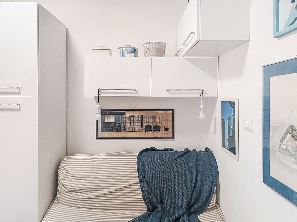 Interior Design, Furniture, Room, Shelving, Shelf, Ceiling, Linens, Bedroom, Cushion, Home Appliance