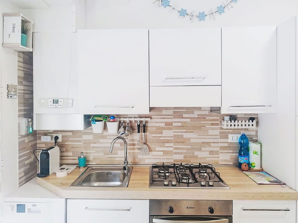 Kitchen, Kitchen Appliance, Countertop, Major Appliance, Cabinetry, Wood, Stove, Interior Design, Kitchen Stove, Kitchen Sink