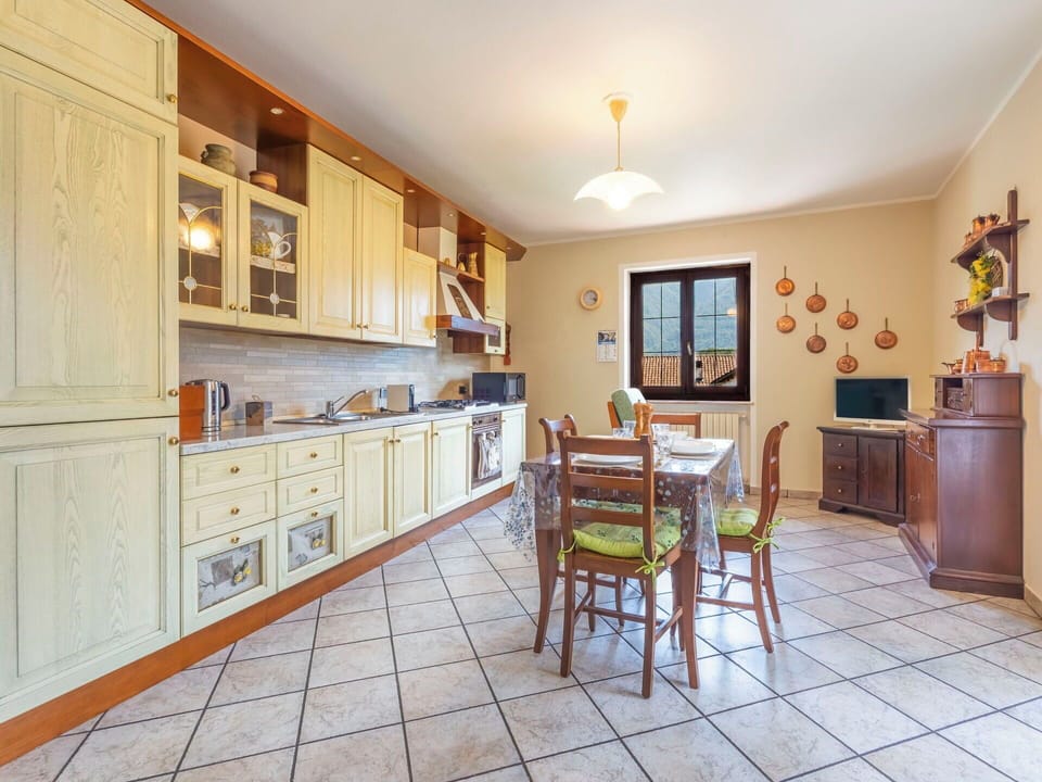 Furniture, Cabinetry, Interior Design, Flooring, Wood, Kitchen, Ceiling, Floor, Cupboard, Room