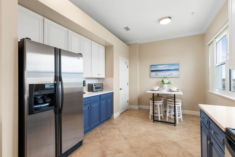 Large Kitchen with a window allowing beautiful morning light to pour in.