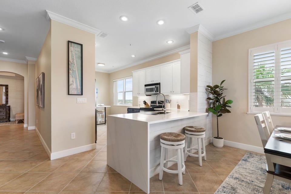 Beautifully Remodelled Kitchen featured Waterfall Edge Countertop!