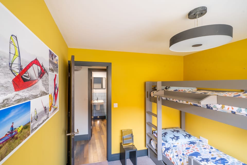 Ground floor: Bedroom four, the bunk room (for children) with the family shower room opposite