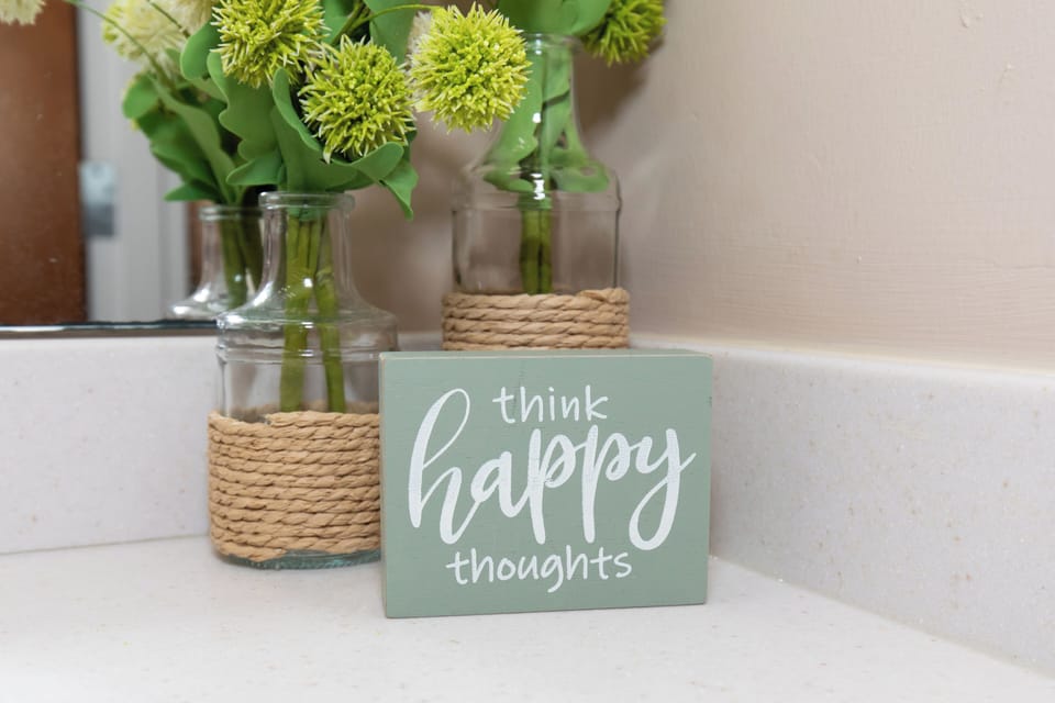 Surround yourself with cheerful touches that inspire positivity during your stay in this thoughtfully decorated space.