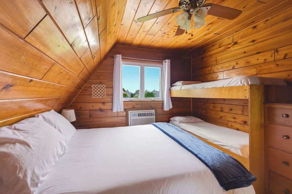 Queen bed and bunk beds make this room ideal for family stays.
