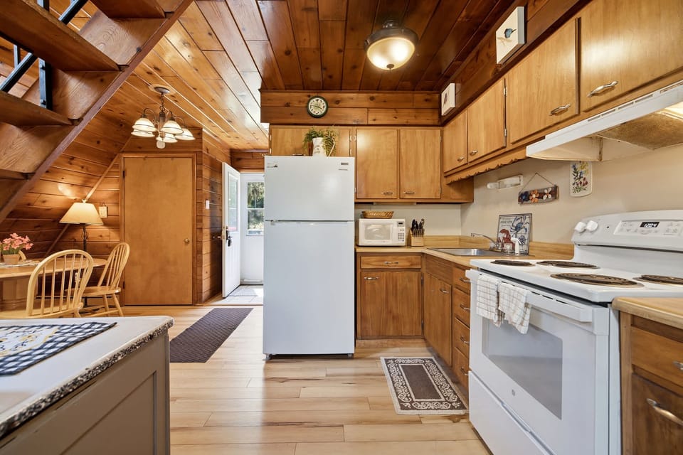 Open to the dining space, the kitchen makes it easy to cook while staying part of the fun.