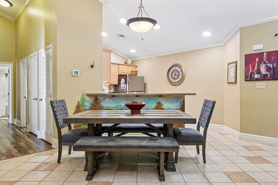 Gather around this stunning dining table where your meals become memorable moments, surrounded by warm décor and thoughtful touches.