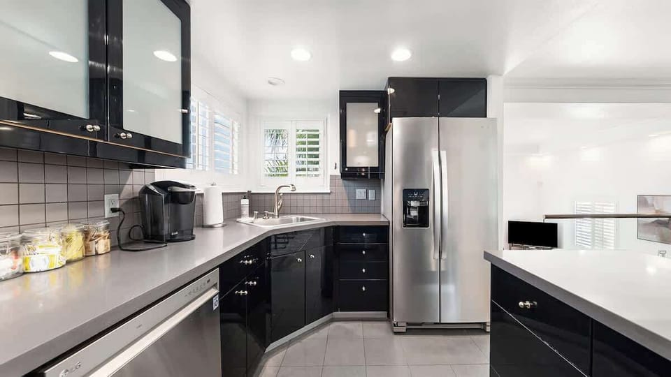 Fully equipped kitchen with modern appliances, perfect for preparing meals or quick snacks during your stay.