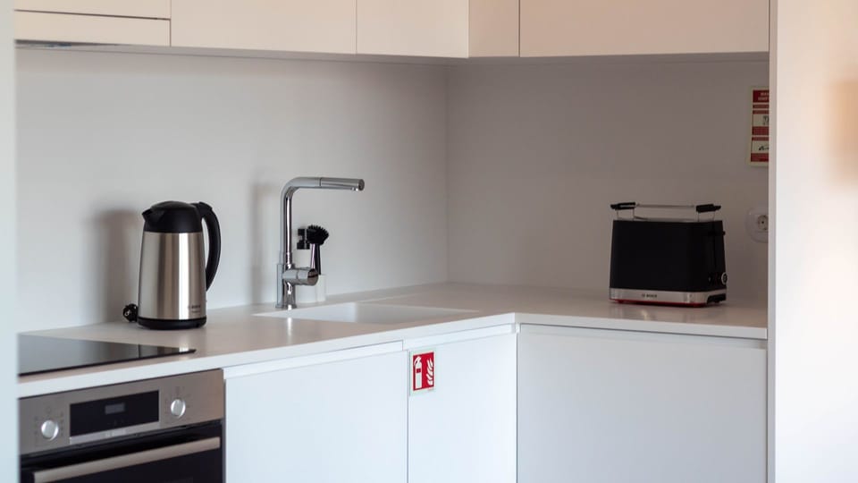 Sleek and modern kitchen, featuring high-end appliances for convenience and simplicity. #ModernKitchen #FunctionalDesign
