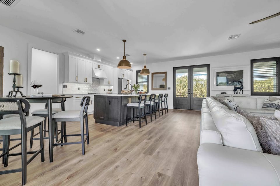 Chic dining space with natural light—perfect for shared meals and memorable moments.