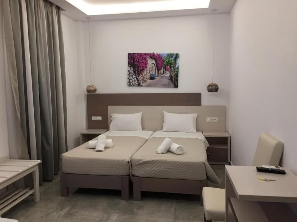 Standard Twin Room, Balcony, Garden View | In-room safe, iron/ironing board, free WiFi