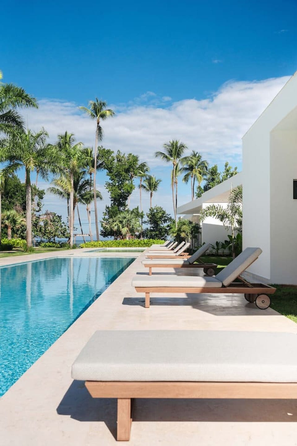 Shared pool with plenty of loungers—easy to spend the day swimming, sunbathing, or relaxing by the water.