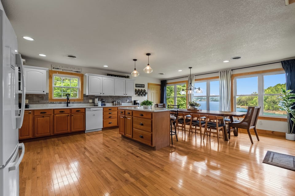 Huge kitchen / living room area with tons of seat for all