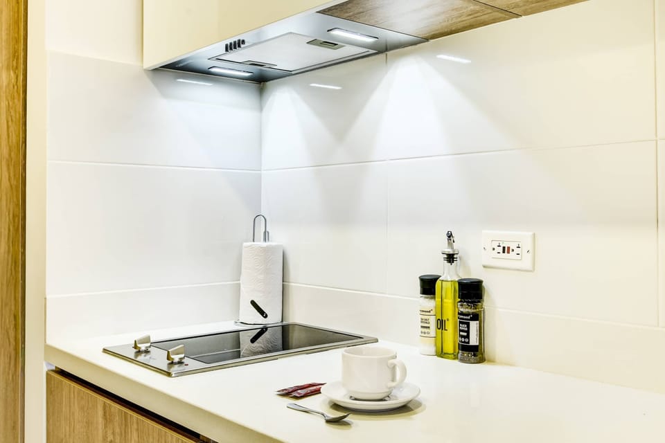 Compact cooking area, perfect for simple meals.