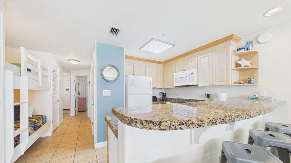 Breakfast bar seating attached to kitchen counter makes for better mornings